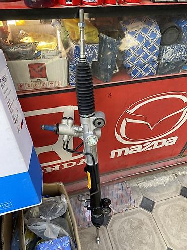 Рулевая рейка в сборе для Mazda. Особенности: - Гидравлическая