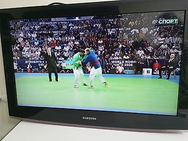 samsung 15: Телевизор Samsung с плоским экраном, диагональ примерно 32–37" — 3