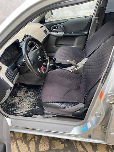 аренда mazda 323: Mazda 323: 2003 г., 1.4 л, Механика, Бензин, Седан — 5