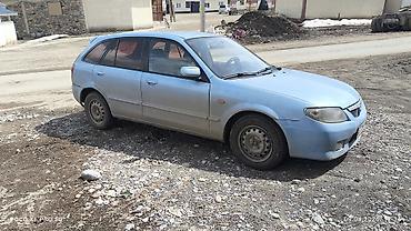 Унаа: Mazda 323: 2002 г., 1.6 л, Кол менен иштөөчү, Бензин, Универсал — 4