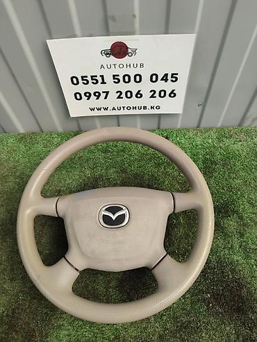 подлокотник демио: Руль Mazda Б/у, Оригинал, Япония — 1