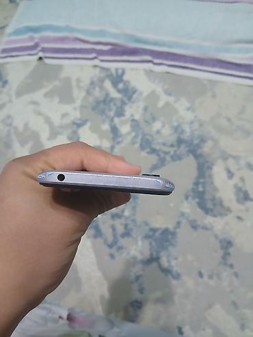 Смартфон Redmi (модель на шильдике: M2006C3LG). Ключевые