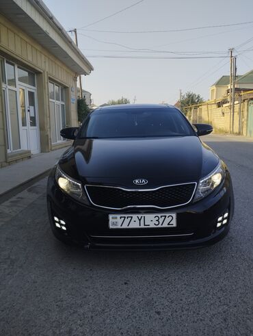 Kia Optima: 2 л | 2014 г. Седан