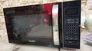 Mikrodalğalı sobalar: Mikrodalğalı soba Sonifer, rəng - Qara, Yeni — 1