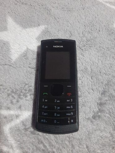 Nokia: Nokija x1 sa dve kartice kao nova radi na sve mreze,baterija — 11