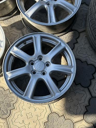 Диски: Комплект оригинальных литых дисков Subaru (4 шт.) - Диаметр: 16" - — 2