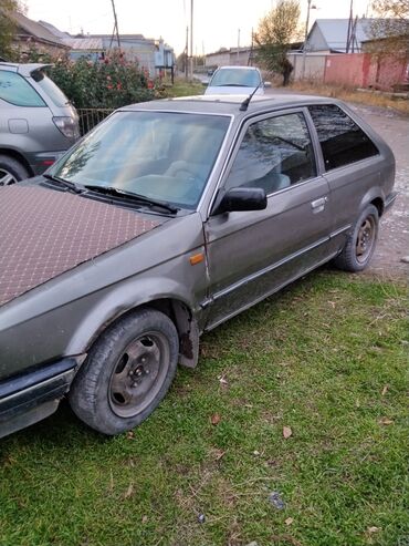 Mazda: Mazda 323: 1986 г., 1.6 л, Механика, Бензин, Купе