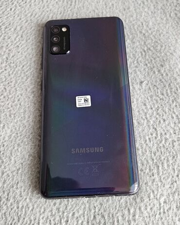 телефоны fly 441: Samsung Galaxy A41, 64 ГБ, цвет - Синий, Отпечаток пальца, Две SIM карты