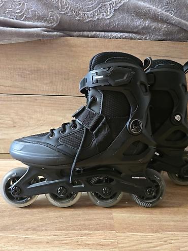 Roliklər: Inline skeytlər (roller skates) – 4 təkərli, qara rəng. - Ölçü: 38 — 4