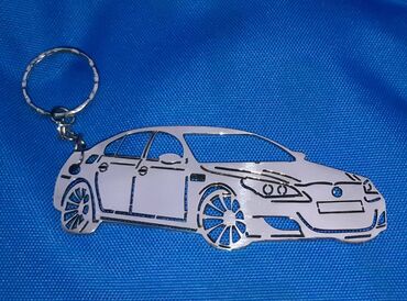 Auto delovi, gume i tjuning: Na prodaju NOV ne korišćen BMW privezak za ključeve. Privezak je