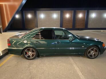 Mercedes-Benz: Mercedes-Benz 240: 2.4 l | 1998 il Sedan — 4