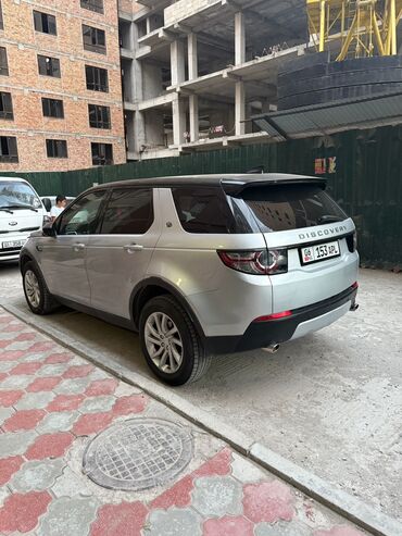 опель внедорожник: Стильный внедорожник Land Rover Discovery Sport серебристого цвета с