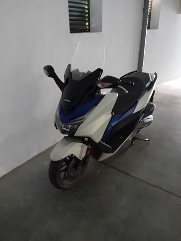 Ostali motocikli i skuteri: Honda Forza skuter,registrovan do jula 2026godine, prepoznatljiv po na lalafo.rs — 8 Ostali motocikli i skuteri: Honda Forza skuter,registrovan do jula 2026godine, prepoznatljiv po — 8