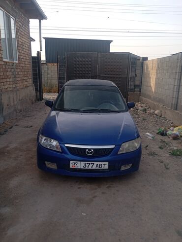 тормозные диски гольф 3: Mazda 323: 2001 г., 1.6 л, Механика, Бензин