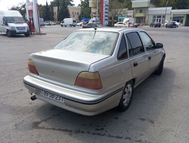 Daewoo: Model: Daewoo Nexia sedan Kuzov: 4 qapılı, gümüşü rəng — 7
