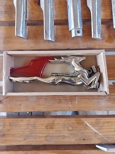 Автозапчасти: Хромированное украшение на капот автомобиля в виде оленя. Деталь имеет — 10