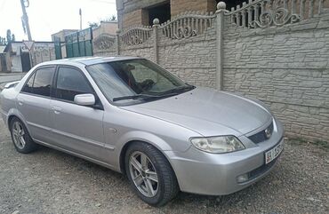 subaru legacy автомабил: Mazda 323: 2002 г., 2 л, Автомат, Бензин, Седан