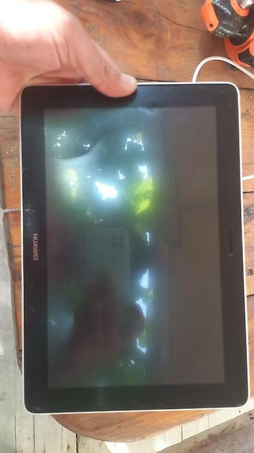 honor band 4: Huawei MediaPad tablet - Brend/model: Huawei MediaPad (arxa qapaqda — 2