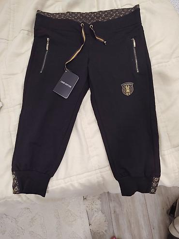 zenske torbe oko struka: Nove, Turske, Ženske sportske pantalone – crne, sa detaljima u — 1