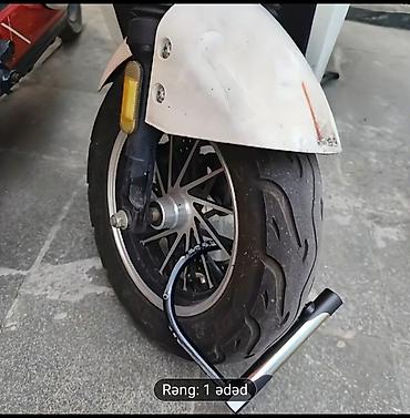 Avtoelektronika: Qara və gümüşü rənglərdə olan moped kilidi. Bu kilid mopediniz — 2