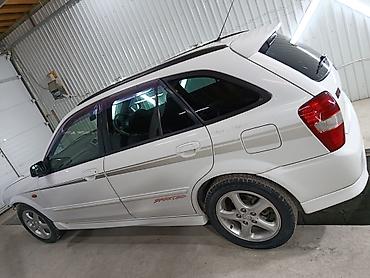 Mazda: Mazda Familia: 2001 г., 2 л, Автомат, Бензин, Универсал — 8