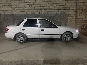 Kia: Kia Sephia: 1.5 l | 1997 il Sedan — 4