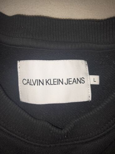 sinsay dukserice: Calvin Klein, L (EU 40), Single-colored, color - Black