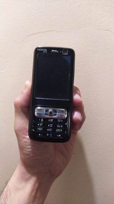 nokia n73 qiymeti: Nokia N73 Ideal Veziyyetde Orginal Antikvar telefondur hec bir