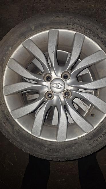 r13 ваз: Литой диск LADA с шиной 185/55 R15 82H. Характеристики: - Диаметр — 2