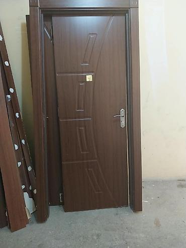 taxda qapi: MDF interyer qapısı – valnöz rəngdə, müasir dizayn. Xüsusiyyətlər: - — 2