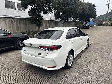 matiz 2006: Toyota Corolla: 2023 г., 1.8 л, Вариатор, Гибрид, Седан — 4