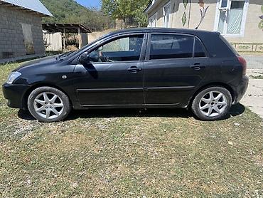 rota grid: Toyota Corolla: 2002 г., 1.6 л, Механика, Бензин, Хэтчбэк — 4