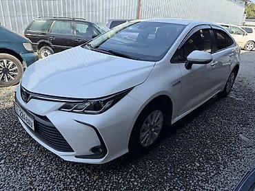 byd 06 ev: Toyota Corolla: 2021 г., 1.8 л, Автомат, Гибрид, Седан — 1