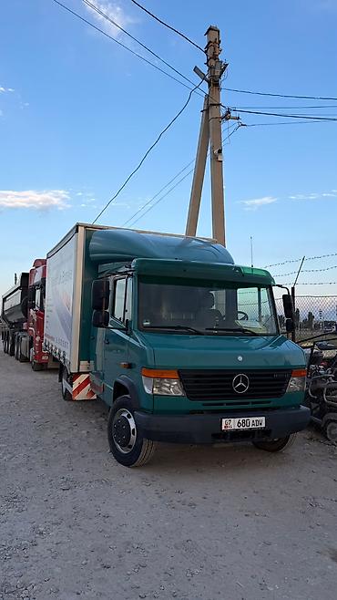 хова каракол: Грузовик Mercedes-Benz Vario (двухрядная кабина) с тентованным — 10
