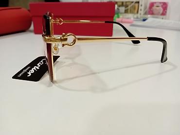 Naočare: Cartier sunčane naočare – ženski model - Oblik: mačkaste (cat-eye) — 9