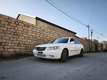 Hyundai: Hyundai Grandeur milvari biznes-sedan. Xüsusiyyətlər və avadanlıq: - — 7