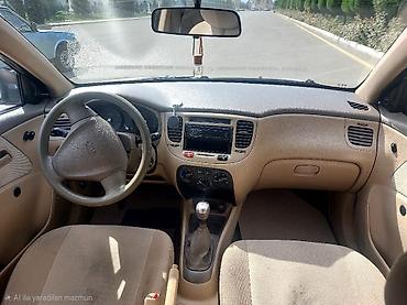 kia rio farası: Kia Rio sedan – qızılı rəng - Kuzov: 4 qapılı sedan, şüşələr — 4
