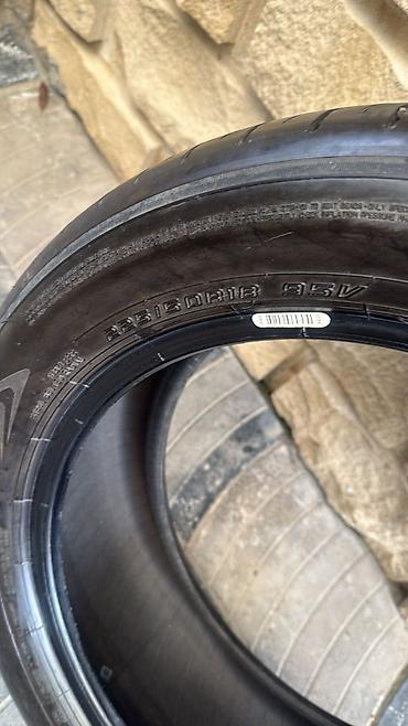 em 50: Dunlop avtomobil şini - Model: Dunlop (yan tərəfdə loqo və yazı) - — 2