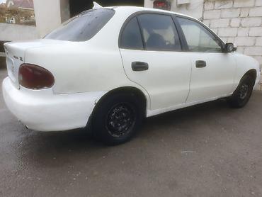 tap az kondisioner: Hyundai Accent: 1.5 l | 1995 il Sedan — 2