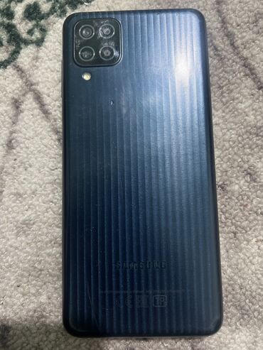 студийные микрофоны: Samsung Galaxy M12, Колдонулган, 32 ГБ, түсү - Көк, 1 SIM, 2 SIM