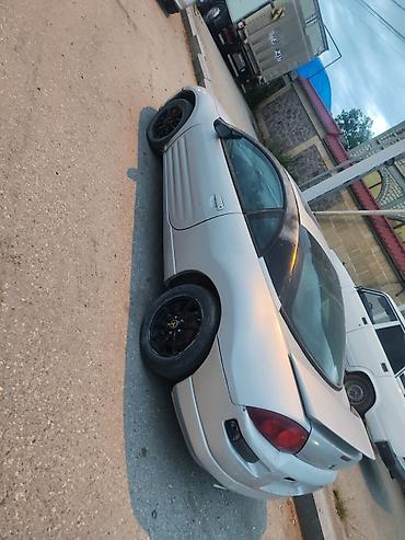 124 kupe: Mitsubishi Eclipse kupе (təxmini 2000–2005 buraxılışı) - Korpusu: 2 — 3