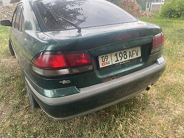 devo matiz: Mazda 626: 1999 г., 2 л, Механика, Бензин, Хэтчбэк — 1