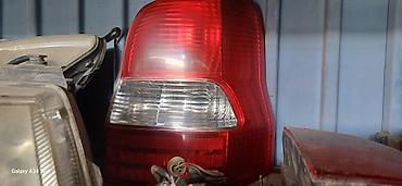 света диоты: Задний фонарь для Mazda Demio 2001 г. - Оригинальный левый задний — 1