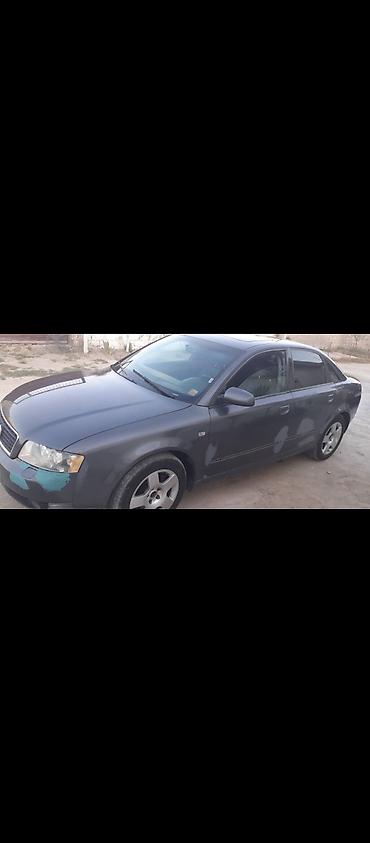 bmw e 38: Audi A4 sedan – tünd boz rəng, 4 qapı, 5 yerlik. B6 kuzov dizaynı — 1