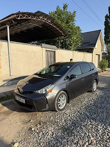королла 1 6: Toyota Prius V: 2016 г., 1.8 л, Автомат, Гибрид, Универсал — 1