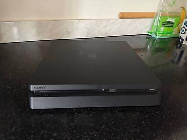ретро консоли портативные: Sony PlayStation 4 Slim (чёрная)обмен на электро велосипед — 1