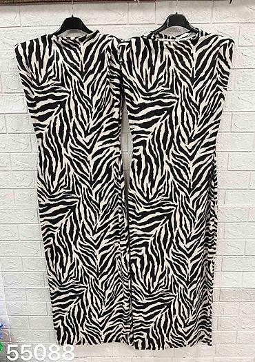 leopard baletanke: Ženska midi haljina sa zebra printom
250 din 
S M L — 2