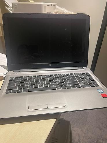 HP noutbuk - Model: HP (gümüşü korpus, klassik HP loqosu) - Ekran