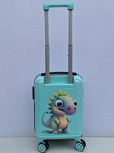suknje ps: Dečiji kofer tirkizne boje sa motivom dinosaurusa. Kofer poseduje — 8