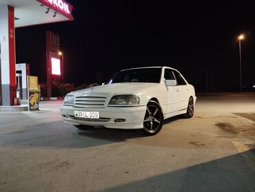 torpaqla barter masin deyisirem: Mercedes-Benz 200: 0.6 l | 1994 il Sedan